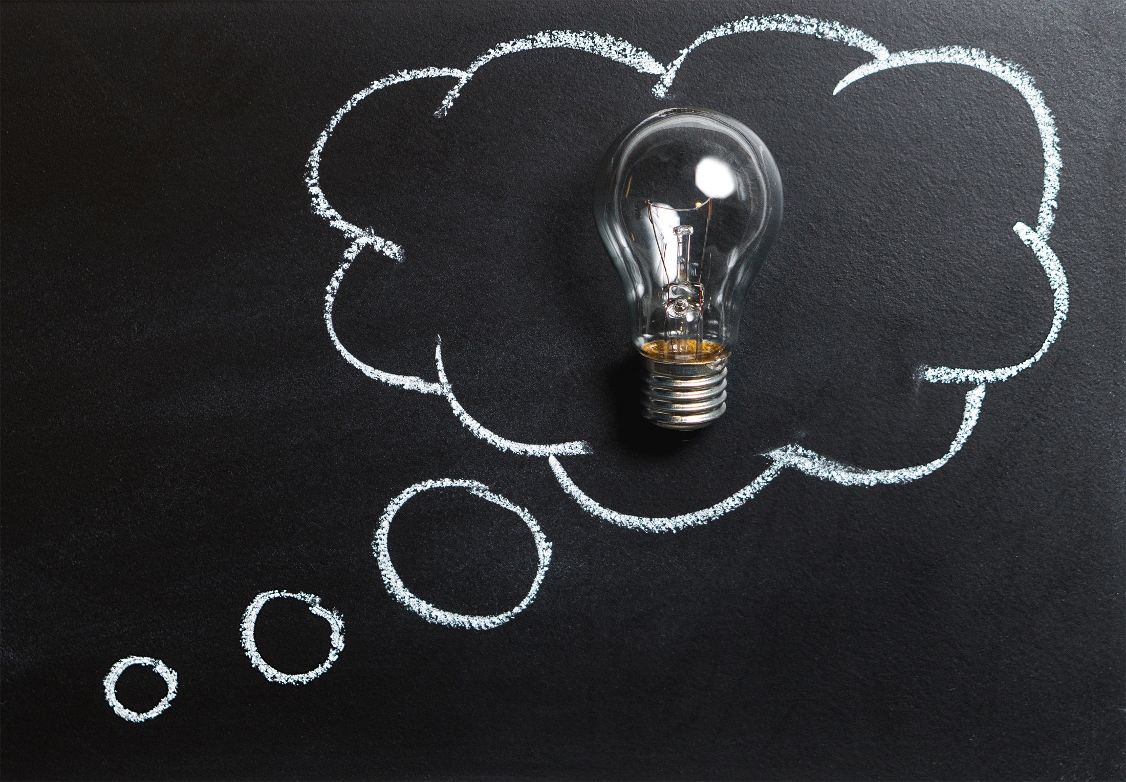 Drawing of a speech bubble with a lightbulb on a blackboard. IQ testing in San Francisco is available for parents & children. We offer IQ testing in Berkeley & San Francisco.