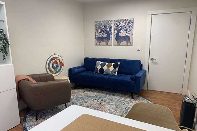 A blue couch inside the office of Mind Matters SF. Representing another area of the office for neuropsychological testing. Where you can sit and talk with a psychologist in Berkeley, CA.