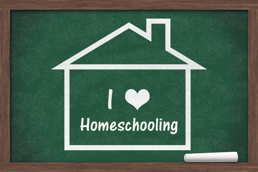 Image of chalkboard with a house that says "I love homeschooling" inside of it. Representing a tool suggested after neuropsychological testing, a psycho-educational evaluation, or autism testing in San Francisco, CA.