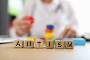 Autism spelled out on wooden blocks. If you are looking for psychoeducational & neuropsychological testing, look no further! We're here for you.