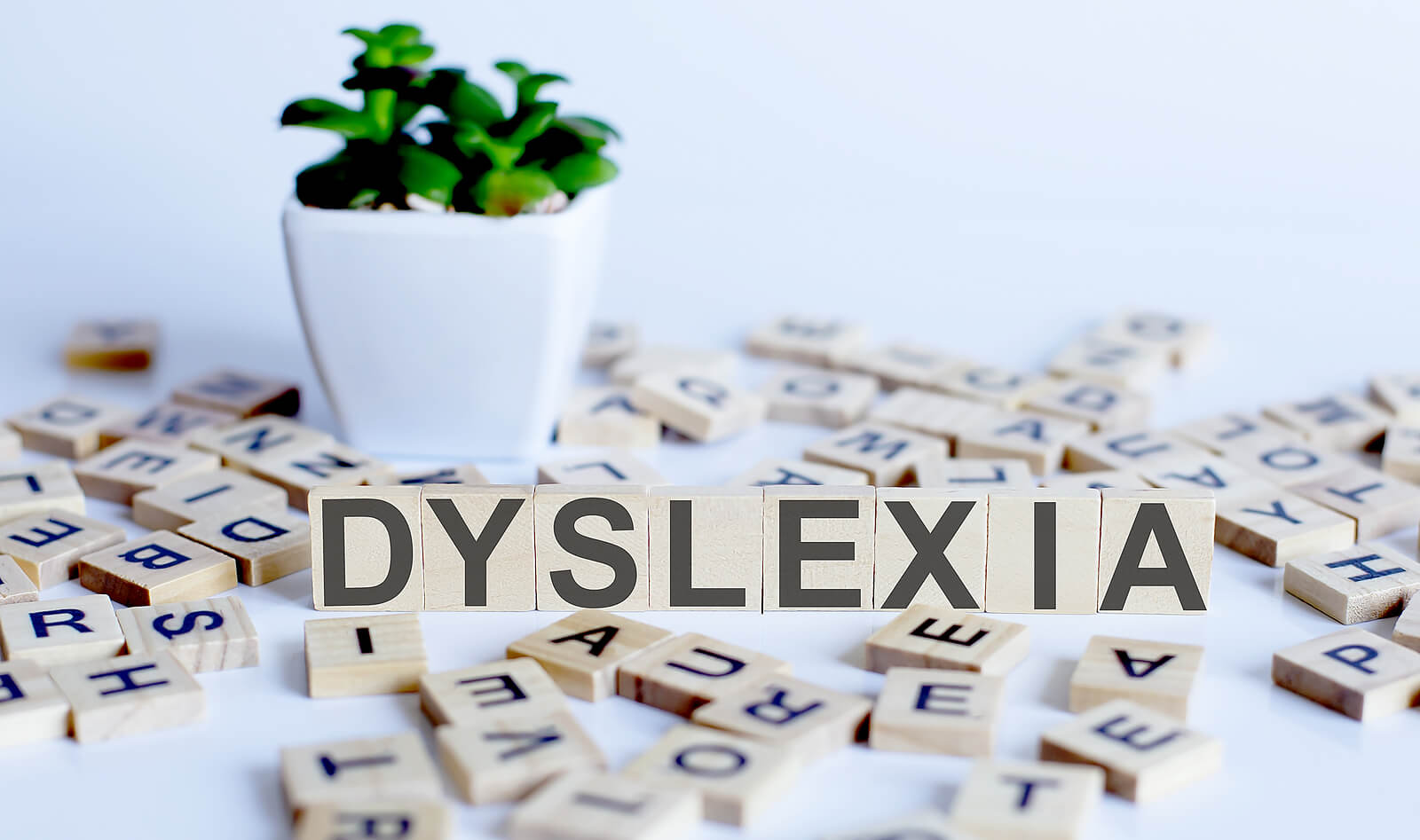 Dyslexia spelled on wooden squares. Discover how dyslexia testing in San Francisco, CA can help your child! Learn more from our psychologists here.