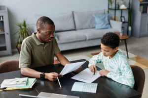 An adult and child working together on homework. Learning disability testing in San Francisco, CA can empower your child. We also offer learning disability testing in Berkeley, CA.