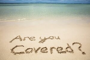 A sandy beach with "are you covered?" in the sand. If you want to learn more about our neurodivergent affirming psychologists, call us today! We do IQ testing in Berkeley, CA & San Francisco, CA. 